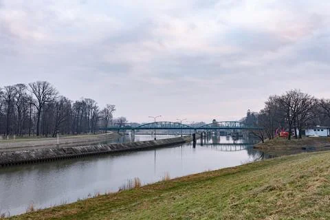 Panorama of canal on Oder river and green metal bridge Stock-Fotos