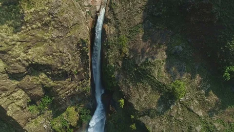 Panorama. Charming precipitious waterfall falling to bottom of river gorge Stock Footage 124680953