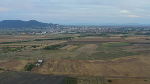 Panorama of the city below the hill in the plain Stock Footage 138649700