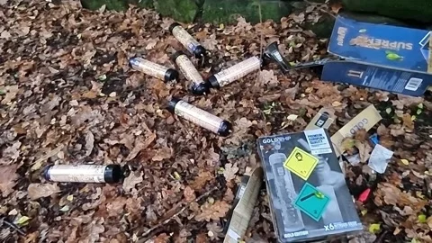 Panorama close view of nitrous oxide drug waste pollution in autumn woodland Stock-Footage 295936900