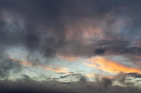 Panorama, cloudy sky at sunset. Pink clouds. Stock Photos