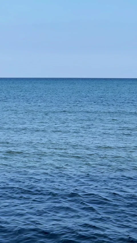 Panorama of the deep blue, calm Mediterranean Sea in Larnaca, Cyprus. A perfect Stock Footage 308918344