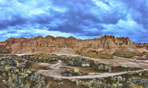 Panorama of Dramatic Desert Formations and Juniper Draw Trail in Cathedral .. Stock Photos