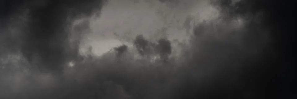 Panorama dramatic storm clouds in dusk sky, rainy and overcast weather. Natural Stock Photos