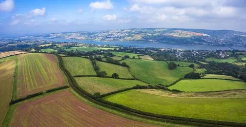 Panorama from a drone of fields over Ringmore and River Teign, Devon, England Stock Photos