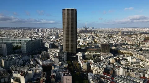 Panorama drone view about the huge Montparnasse Tower and cityscape with Eiffel Stock Footage 295937404