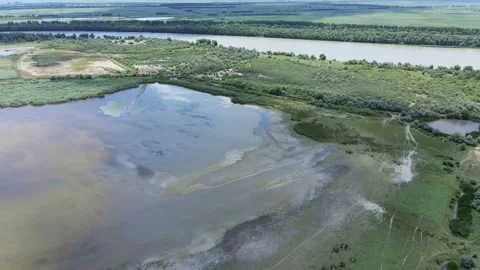 Panorama of Ermakov island, Camera moves downwards. Aerial view, 4K-60fps. Stock Footage 143648078