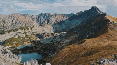 Panorama of the fall mountains. View of the lake in the mountains Stock Footage 254607866