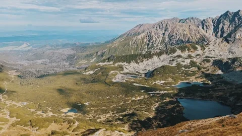Panorama of the fall mountains. View of the lake in the mountains Stock Footage 254608017