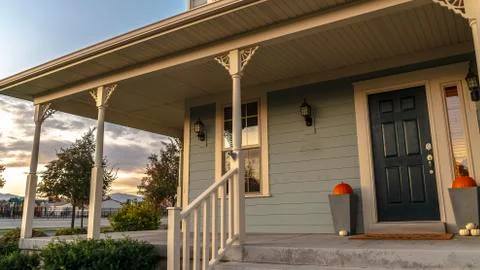 Panorama frame Steps and covered porch on a timber clad house Fotos de archivo