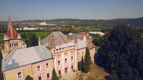 Panorama of green fields with a medieval castle and small town Stock Footage 67317463