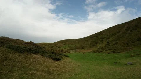 Panorama of green mountain range inside the crater of the former Stock Footage 40745716