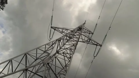 Panorama of a high-voltage column in the summer against a dark sky. Stock Footage 131558848