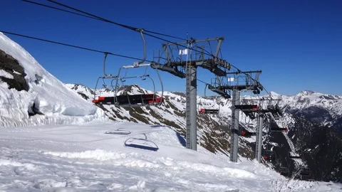 Panorama horizontal. Many people start skiing on a well-groomed ski slope at a Stock Footage 109528712