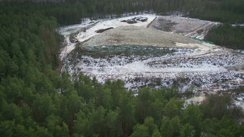 Panorama of a huge garbage dump in the forest in the winter season, aerial view 库存影片 239195874