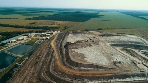 Panorama of a huge garbage dump. Seagulls circling over the garbage. Stored 動画素材 114473094