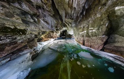 Panorama inside ice cave with icicles on Baikal, Olkhon Stock Photos
