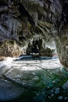 Panorama inside ice cave with icicles on Baikal, Olkhon Stock Photos