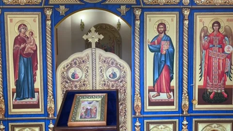 Panorama of the interior decoration of the chapel close-up, icons and candles Stock Footage 159729500