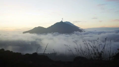 Panorama of ithe mountains, volcanoes, lake, sky and clouds early morning Stock Footage 83696450