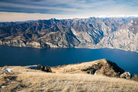 Panorama of Lake Garda seen from the top of Mount Baldo, Italy. Stock Photos