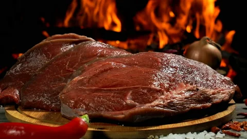 Panorama on a large piece of beef garlic and peppers Stock Footage 218477980