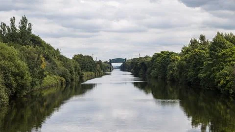 Panorama looking down the Manchester Ship Canal Stock Photos