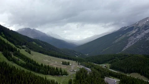 Panorama of the misty mountains and dark cloudy sky Stock Footage 233290971