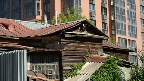 Panorama from modern multi-storey building to old wooden house in Penza, Russia Stock Footage 294625446