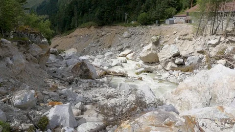 Panorama of a mountain river. Consequences of mudflow Stock Footage 94424972