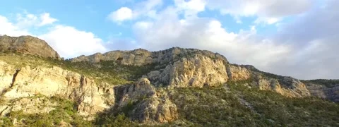 Panorama of mountain in sunset  or sunrise, movie aerial shots in 4k Stock Footage 52531707