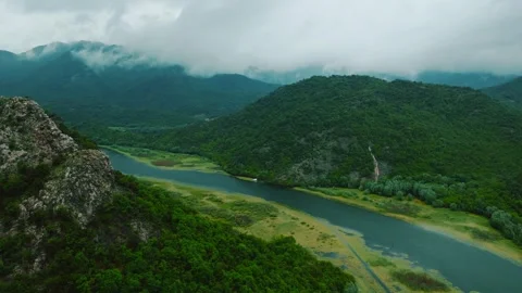 Panorama of mountainous terrain with river valleys. Stockbeeldmateriaal 260486174