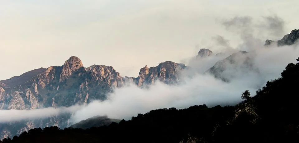 Panorama of Mountains Between the Clouds 2 Stock Photos