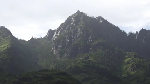 Panorama of the mountains in the rain Stock Footage 77396127