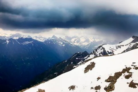Panorama of mountains scene with dramatic blue sky in national park of Dombay Stock Photos
