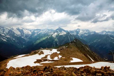 Panorama of mountains scene with dramatic blue sky in national park of Dombay Stock Photos