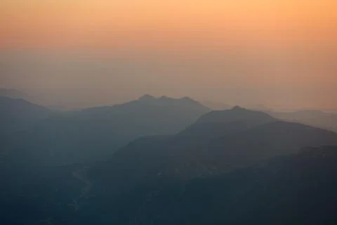Panorama of the mountains at sunset. Stock Photos