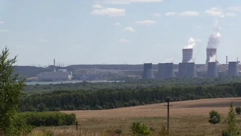Panorama nuclear power plant, reactors, smoke and pipes Video stock 137656833