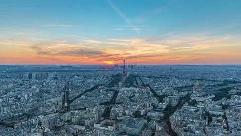 Panorama of Paris at sunset timelapse. Eiffel tower aerial view from observat Stock Photos