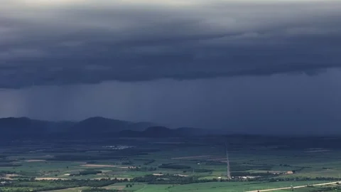 Panorama of Persistent rain over mountains paints dramatic picture of tropical Stock Footage 314358211