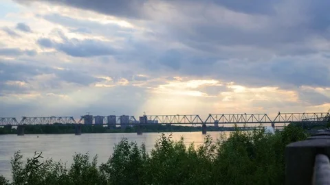Panorama promenade in the evening. Sun rays through the clouds 動画素材 76516399