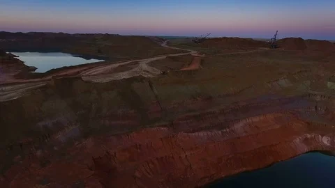 Panorama of the quarry. Artificial lake. Sunset. Horizon. Development of Video stock 74151539
