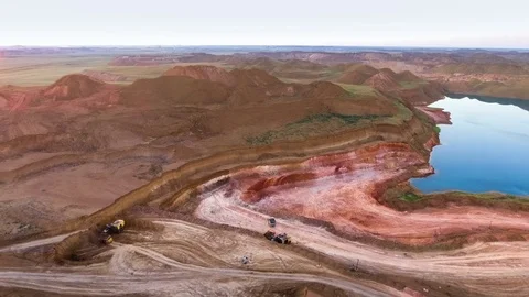Panorama of the quarry. Artificial lake. Sunset. Horizon. Development of Stock-Footage 74154570