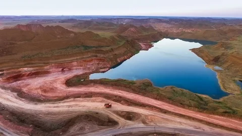 Panorama of the quarry. Artificial lake. Sunset. Horizon. Development of Vídeo Stock 74161302