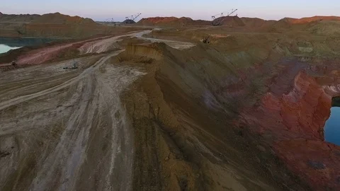 Panorama of the quarry. Artificial lake. Sunset. Horizon. Development of Stock Footage 74214070
