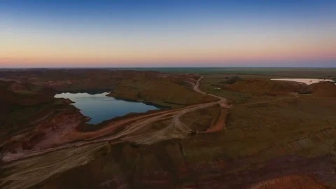 Panorama of the quarry. Artificial lake. Sunset. Horizon. Development of Stock Footage 74214952