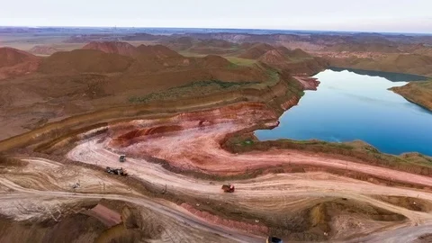 Panorama of the quarry. Artificial lake. Sunset. Horizon. Development of Video stock 74215677