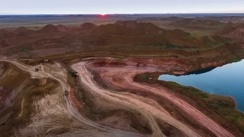 Panorama of the quarry. Artificial lake. Sunset. Horizon. Development of Stockbeeldmateriaal 74217090