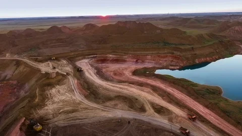 Panorama of the quarry. Artificial lake. Sunset. Horizon. Development of Stock Footage 74217842