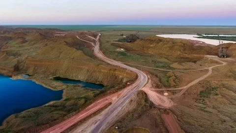 Panorama of the quarry. Artificial lake. Sunset. Horizon. Development of Stock Footage 74220638
